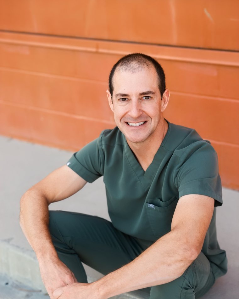 Peter O'Brien, NP, founder of Go Time Health, in scrubs